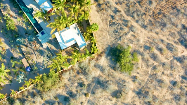 TODOS SANTOS BCS MEXICO-2021: Residential Neighborhood Beside Dry Grassy Field
