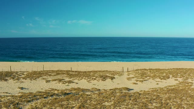 TODOS SANTOS BCS MEXICO-2021: Gentle Ocean Waves Breaking on Sandy Beach