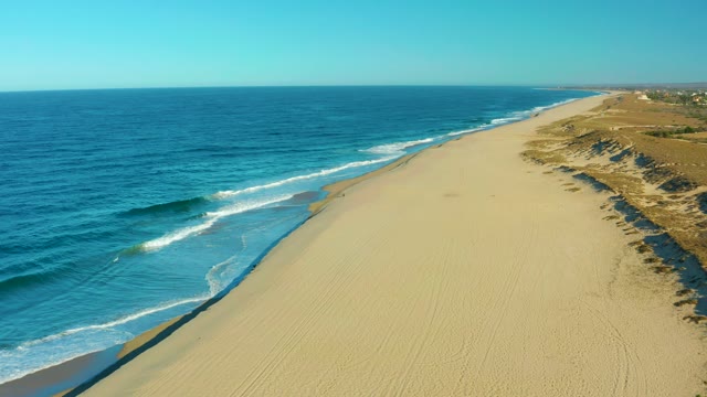 TODOS SANTOS BCS MEXICO-2021: Waves Rolling Onto Sandy Beach From Above