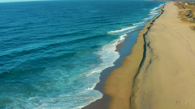 TODOS SANTOS BCS MEXICO-2021: Ocean Waves Rolling Onto Sandy Shoreline