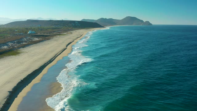 TODOS SANTOS BCS MEXICO-2021: Waves Rolling Onto Sandy Beach From Above