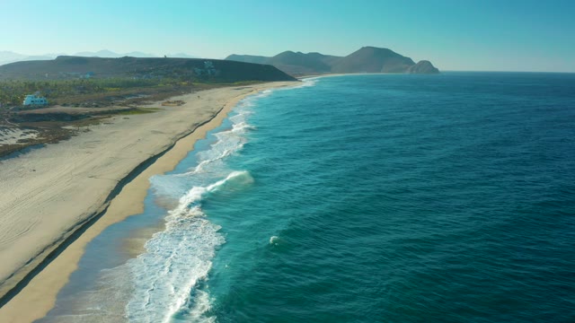 TODOS SANTOS BCS MEXICO-2021: Waves Rolling Onto Sandy Coast From Aerial View