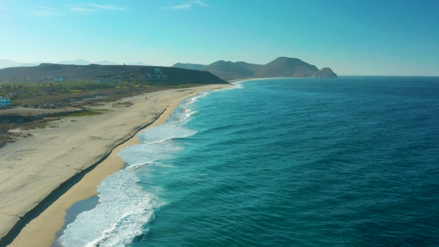 TODOS SANTOS BCS MEXICO-2021: Gentle Ocean Waves Lapping at a Sandy Beach