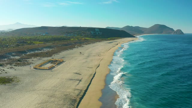 TODOS SANTOS BCS MEXICO-2021: Sandy Beach with Ocean Waves and Distant Hills