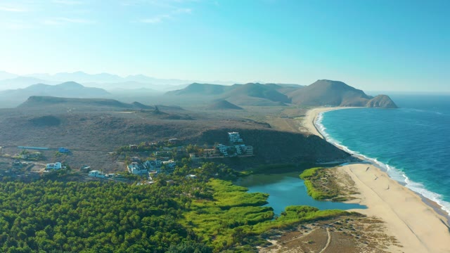 TODOS SANTOS BCS MEXICO-2021: Coastal Buildings and Sandy Beach with Greenery
