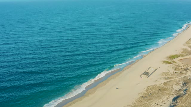 TODOS SANTOS BCS MEXICO-2021: Beachgoers Moving Along the Shore with Ocean Waves