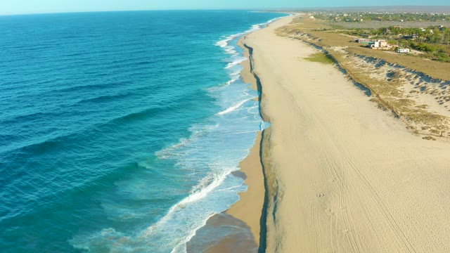 TODOS SANTOS BCS MEXICO-2021: Ocean Waves Rolling Onto Sandy Beach