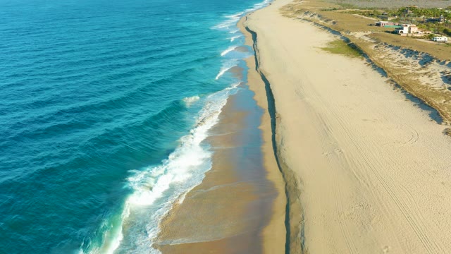 TODOS SANTOS BCS MEXICO-2021: Ocean Waves Washing over Sandy Beach