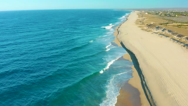 TODOS SANTOS BCS MEXICO-2021: Gentle Ocean Waves Rolling Onto Sandy Beach
