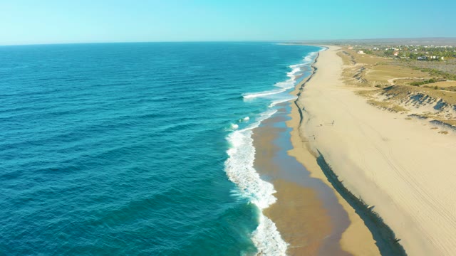 TODOS SANTOS BCS MEXICO-2021: Waves Rolling Onto a Sandy Coastline