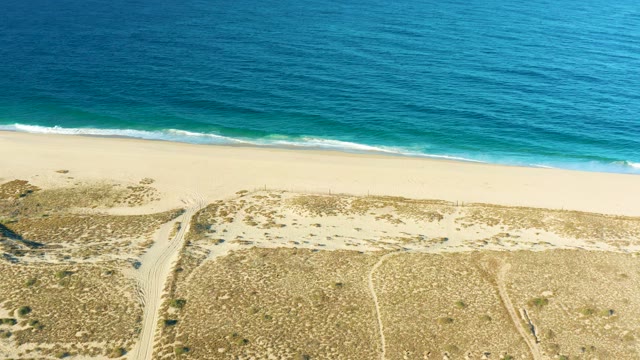TODOS SANTOS BCS MEXICO-2021: Gentle Ocean Waves Rolling Onto Sandy Shore