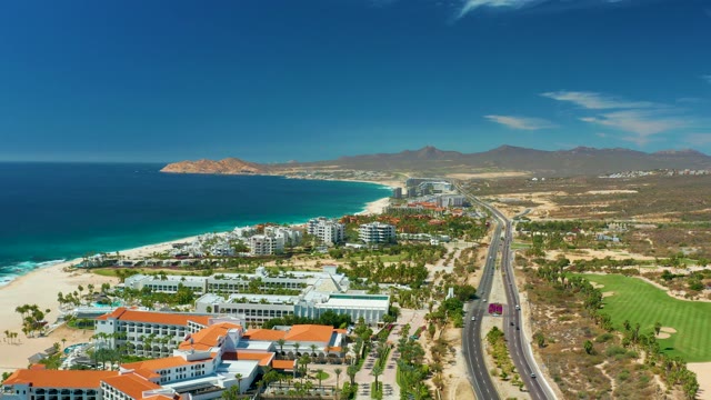 MARQUIS LOS CABOS MEXICO-2021: Coastal Buildings, Sandy Beach, and Road