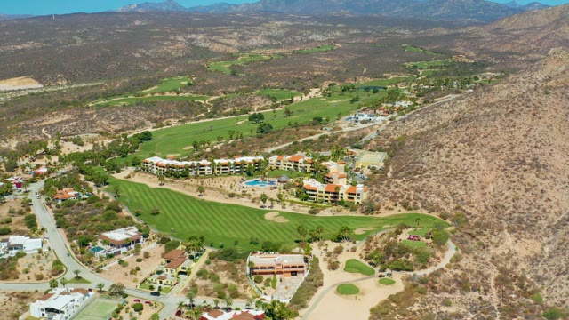MARQUIS LOS CABOS MEXICO-2021: Golf Course and Car Moving on Road