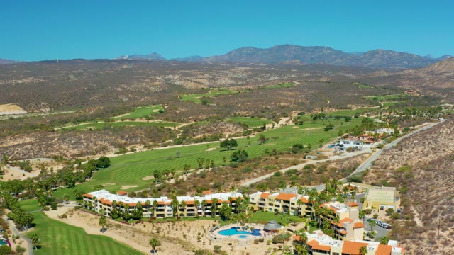 MARQUIS LOS CABOS MEXICO-2021: Resort and Golf Course Aerial Pan Across Mountain Valley