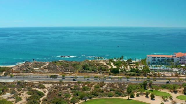 MARQUIS LOS CABOS MEXICO-2021: Coastal Highway with Ocean View and Moving Traffic
