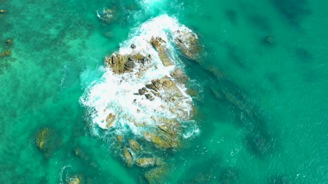 MARQUIS LOS CABOS MEXICO-2021: Waves Crashing on Rocky Ocean Seabed