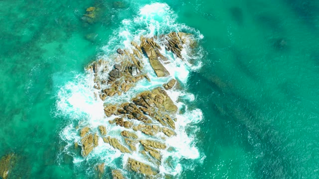 MARQUIS LOS CABOS MEXICO-2021: Waves Crashing on Rocky Ocean Outcrop From Above