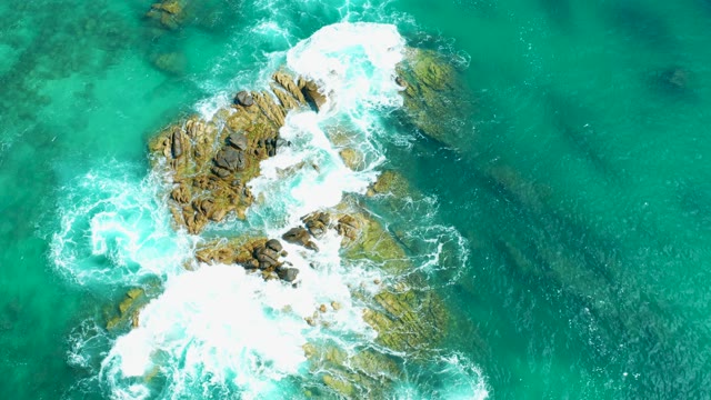 MARQUIS LOS CABOS MEXICO-2021: Ocean Waves Crashing on Rocky Formation