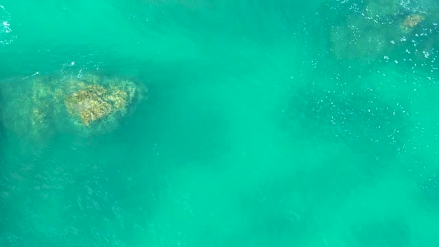 MARQUIS LOS CABOS MEXICO-2021: Clear Turquoise Water with Submerged Rocks and Gentle Ripples