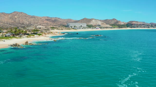MARQUIS LOS CABOS MEXICO-2021: Beach and Ocean From Aerial Perspective with Mountain Background
