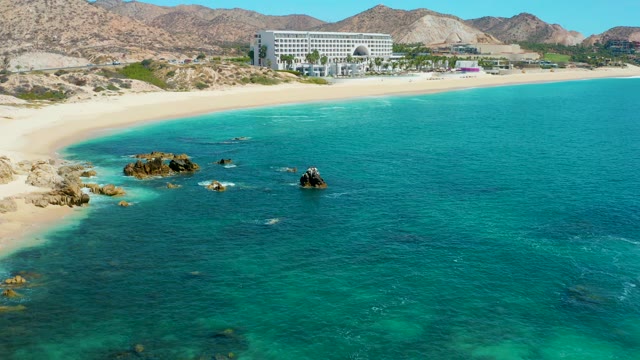 MARQUIS LOS CABOS MEXICO-2021: Sandy Beach and Turquoise Ocean with Rocky Formations