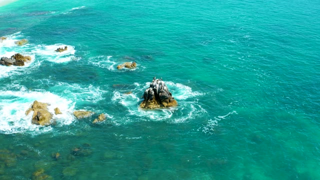 MARQUIS LOS CABOS MEXICO-2021: Waves Breaking on Coastal Rock Formations