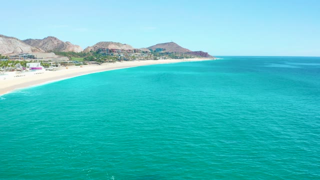 MARQUIS LOS CABOS MEXICO-2021: Gentle Waves Along Sandy Shore and Turquoise Ocean