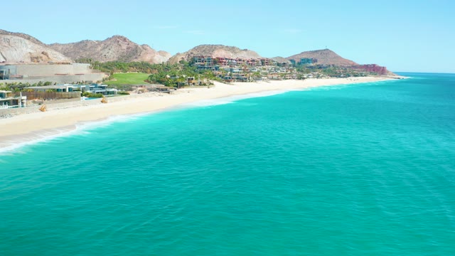 MARQUIS LOS CABOS MEXICO-2021: Waves Breaking on Sandy Shore From Above