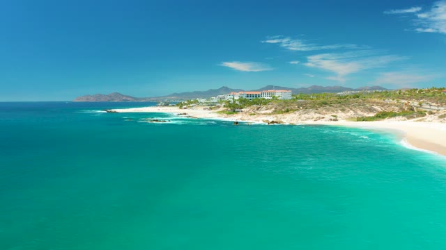 MARQUIS LOS CABOS MEXICO-2021: Gentle Ocean Waves Lapping Sandy Beach Coastline