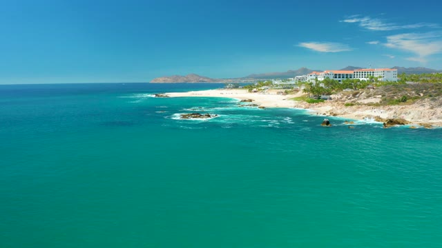 MARQUIS LOS CABOS MEXICO-2021: Coastal Shoreline with Turquoise Waters and Buildings