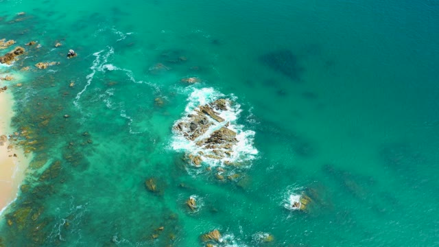 MARQUIS LOS CABOS MEXICO-2021: Waves Crashing Against Rocky Shore From Above