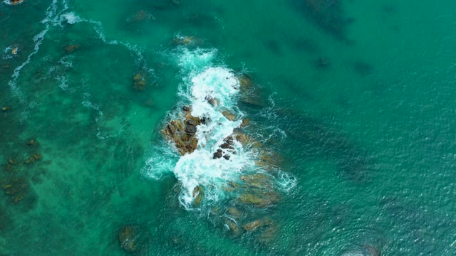 MARQUIS LOS CABOS MEXICO-2021: Waves Crashing on Rocky Seabed Aerial