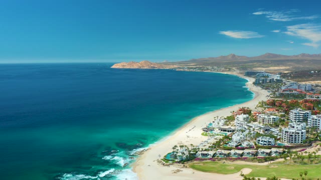 MARQUIS LOS CABOS MEXICO-2021: Beachgoers Increasing on Sunny Coastal Shoreline
