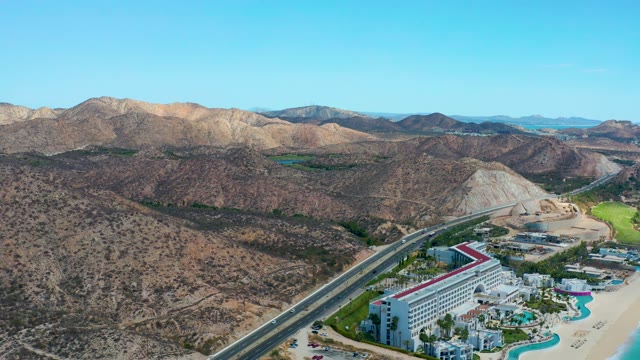 MARQUIS LOS CABOS MEXICO-2021: Coastal Hotel, Highway, and Mountainous Landscape