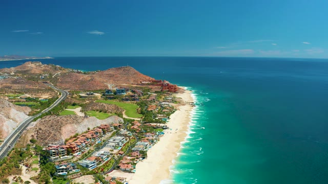 MARQUIS LOS CABOS MEXICO-2021: Coastal Highway, Beach, and Ocean with Drifting Clouds