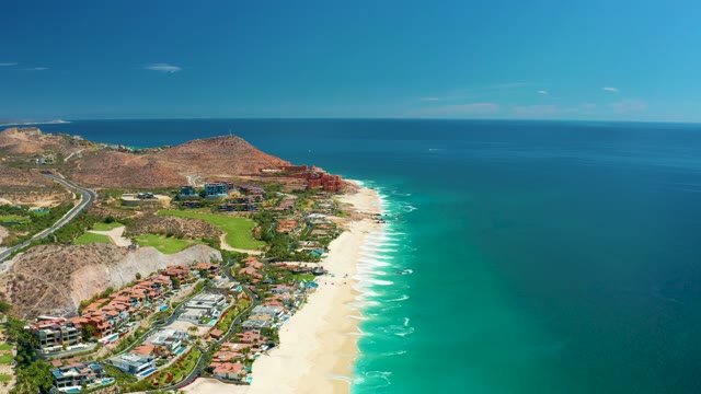 MARQUIS LOS CABOS MEXICO-2021: Coastal Beach with People Appearing over Time