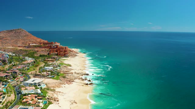 MARQUIS LOS CABOS MEXICO-2021: Coastal Waves and Hillside Buildings