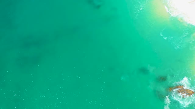 MARQUIS LOS CABOS MEXICO-2021: Gentle Ocean Waves Lapping at Sandy Shoreline