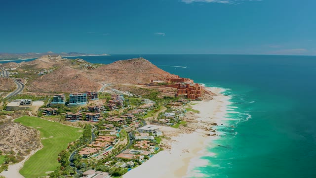 MARQUIS LOS CABOS MEXICO-2021: Coastal Road with Vehicle Moving Past