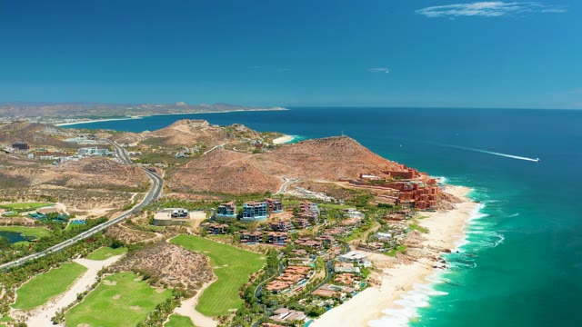 MARQUIS LOS CABOS MEXICO-2021: Coastal Highway with Vehicle Traveling Near Beach