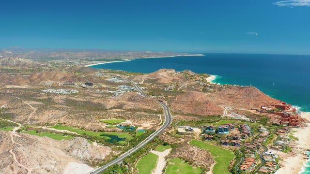 MARQUIS LOS CABOS MEXICO-2021: Coastal Highway with Moving Vehicle and Sky Changes