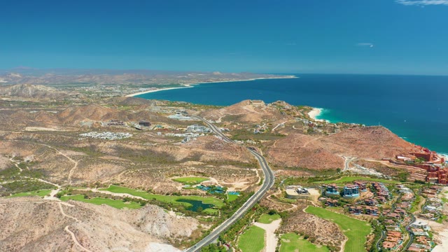 MARQUIS LOS CABOS MEXICO-2021: Winding Coastal Road Through Arid Hills and Ocean