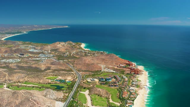 MARQUIS LOS CABOS MEXICO-2021: Coastal Highway with Moving Car and Bird