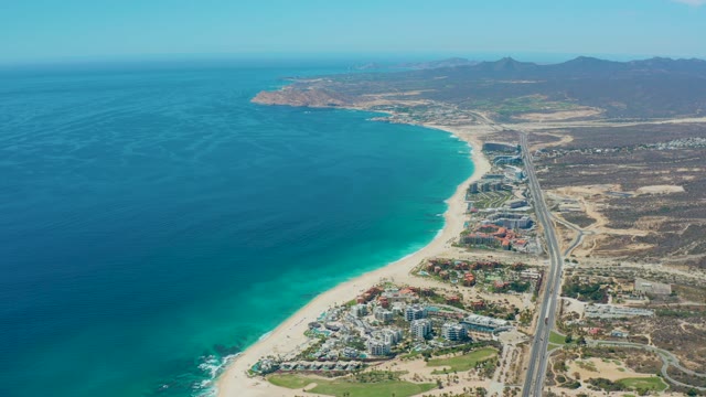 MARQUIS LOS CABOS MEXICO-2021: Coastal Highway with Moving Vehicle and Beach