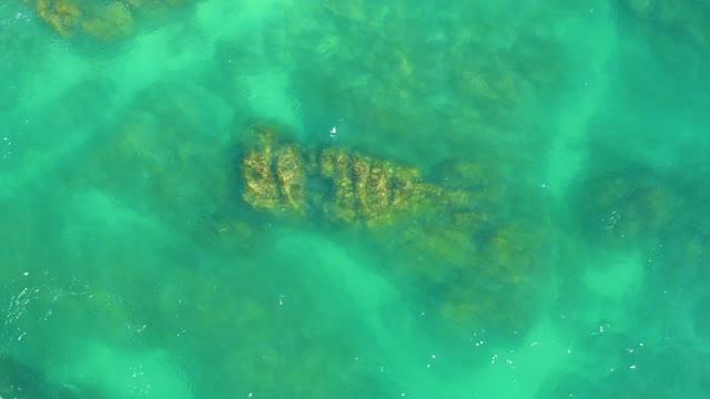 DREAMS LOS CABOS BCS MEXICO-2021: Clear Turquoise Water Over Underwater Rocks and Coral