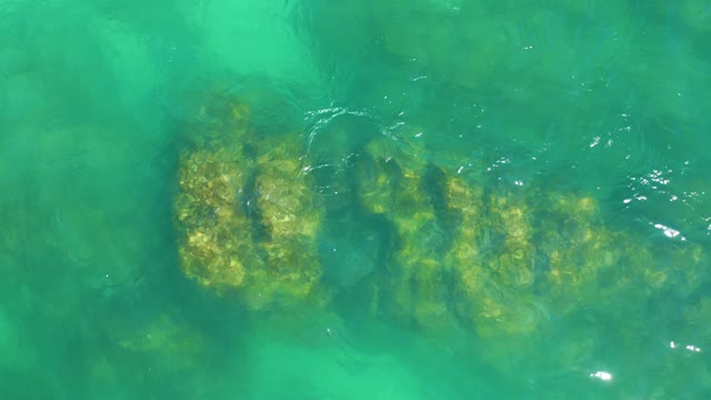 DREAMS LOS CABOS BCS MEXICO-2021: Rippling Clear Water Over Submerged Rocks