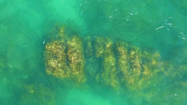 DREAMS LOS CABOS BCS MEXICO-2021: Submerged Rocks Visible Through Clear Turquoise Water