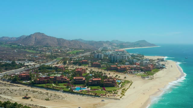 DREAMS LOS CABOS BCS MEXICO-2021: Coastal Resort, Highway Traffic, and Ocean Waves