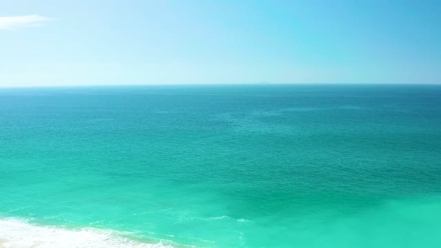 DREAMS LOS CABOS BCS MEXICO-2021: Gentle Ocean Waves Lapping Sandy Shore