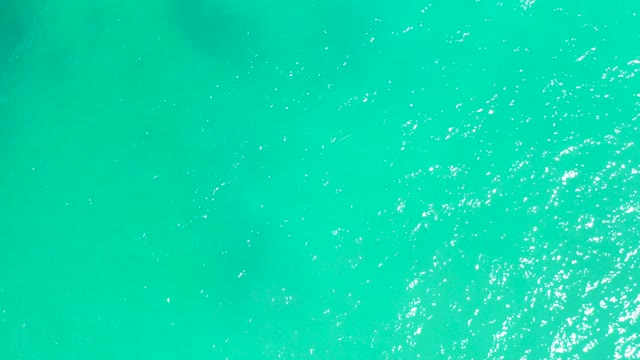 DREAMS LOS CABOS BCS MEXICO-2021: Shimmering Turquoise Ocean Surface with Sunlight Reflections